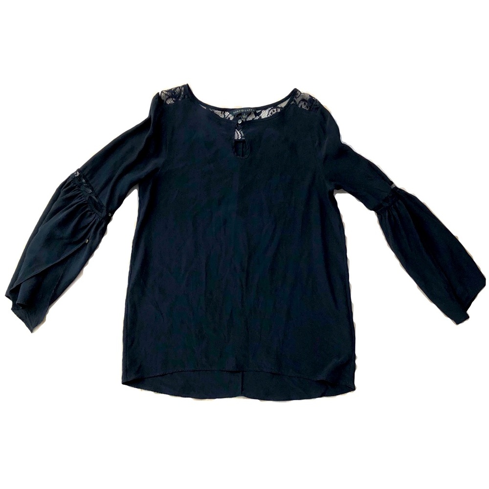 Black top w/ lace by the neck and on the sleeves.  Looser fit